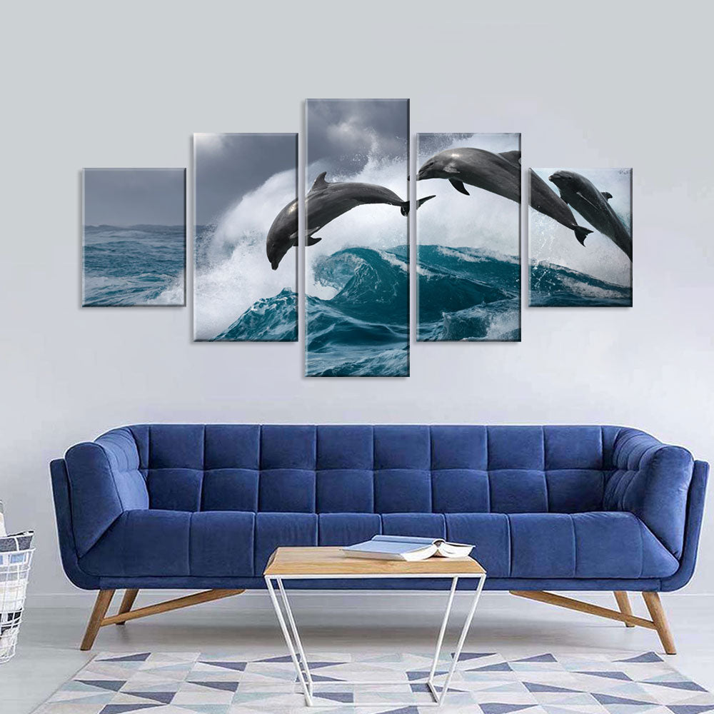 Dolphins Jumping Over Breaking Wave Canvas Wall Art